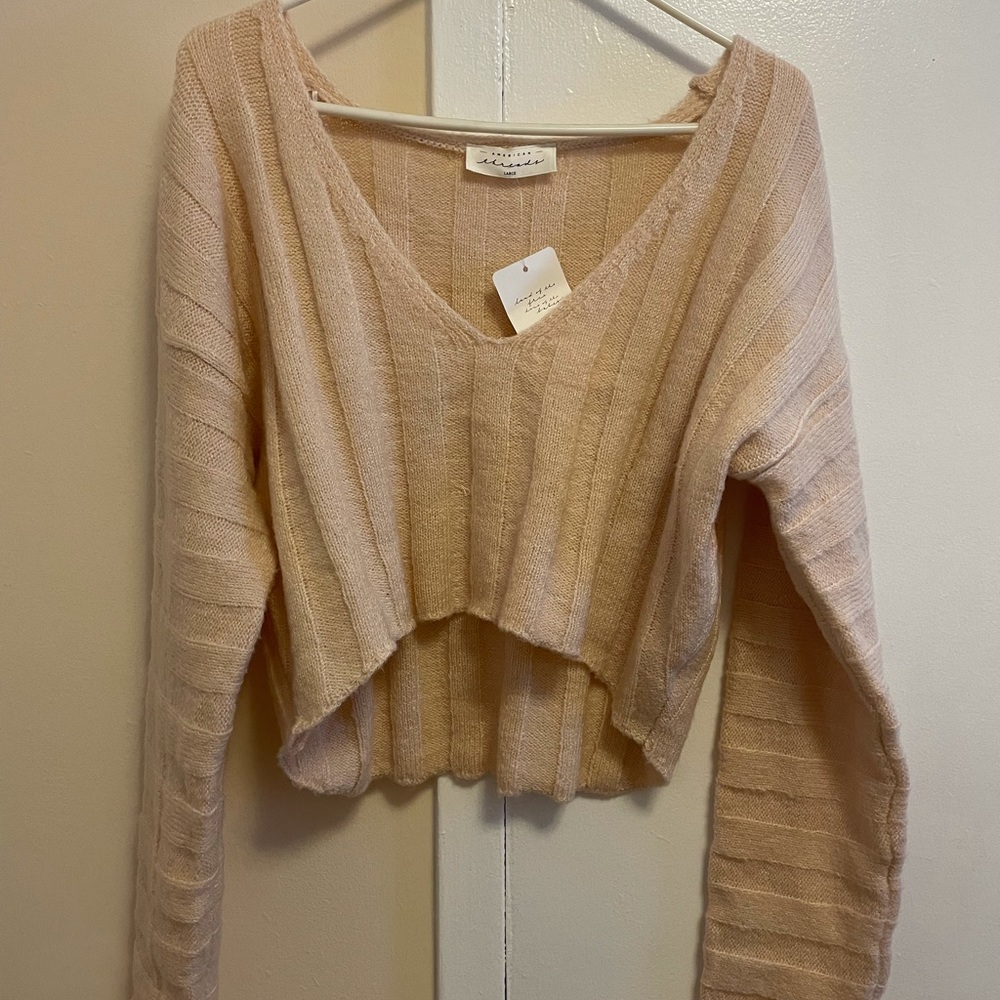 Cropped creme color sweater